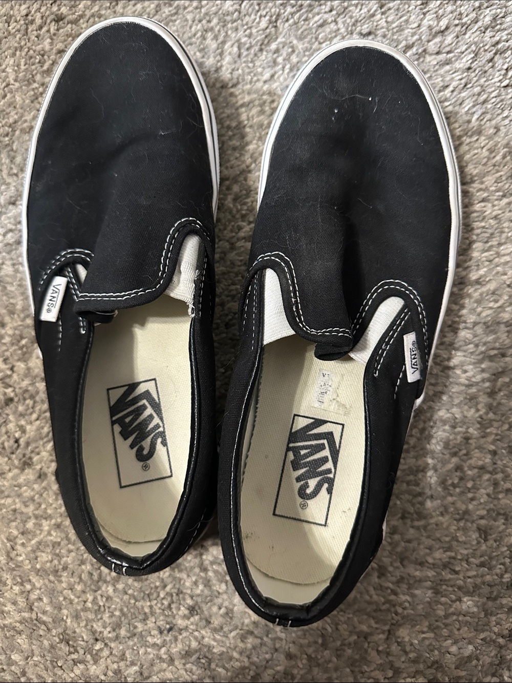 Vans Black and White Slip-On Canvas Sneakers